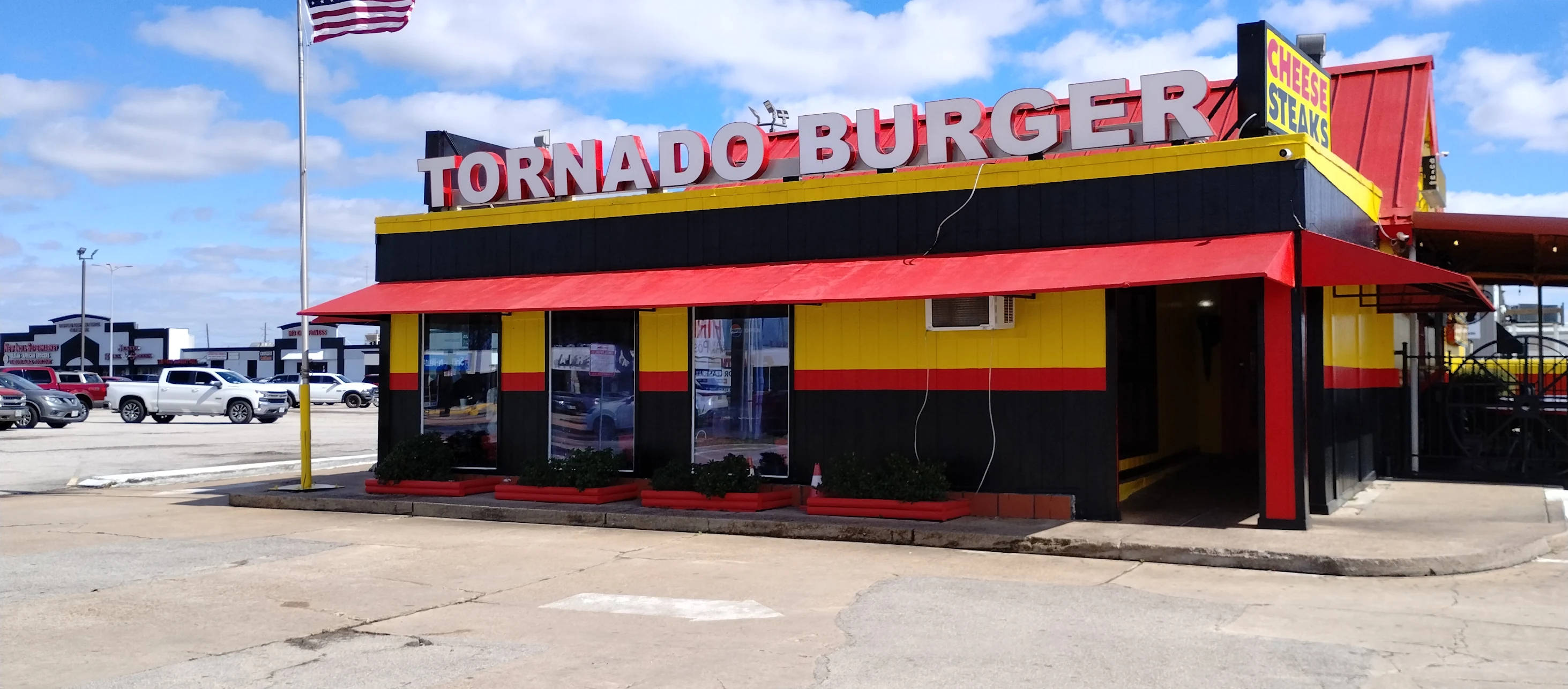 Tornado Burger storefront on a sunny day